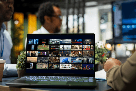 picture of a laptop with Witbe's virtual NOC in a working environment