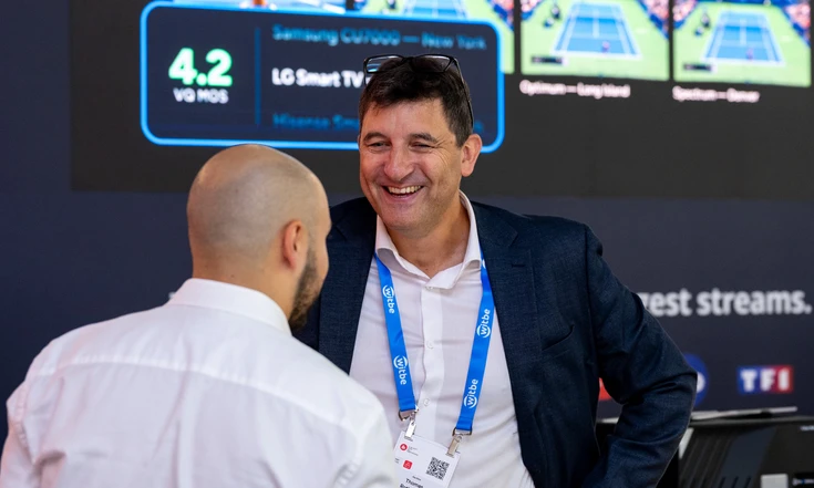 Thomas Rothheudt chatting with a visitor on the Witbe booth at IBC 2026.