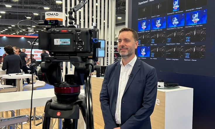 Yoann Hinard being filmed on the Witbe booth at NAB 2026 in Las Vegas.