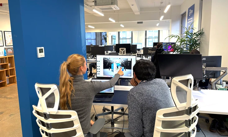 Witbe team collaborating in the Manhattan office.