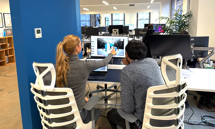 Witbe team collaborating in the Manhattan office.