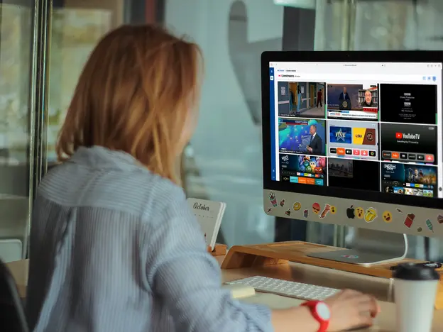 Witbe QoE monitoring on a desktop computer showing multiple video streams tested in real time.