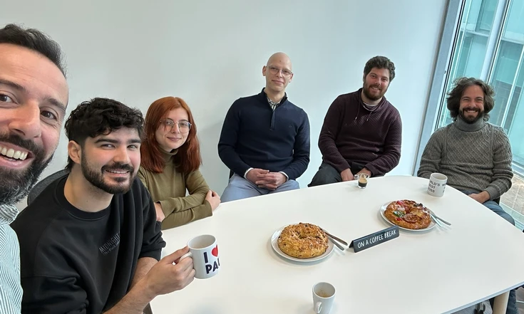Witbe team in Lisbon sharing pastries and coffee at the office.