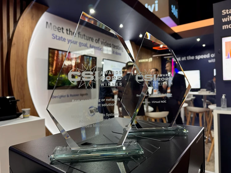 Close-up of Witbe’s CSI Awards 2025 trophies for Best Monitoring Solution and Best Data & Analytics Solution, displayed at the company’s booth.